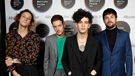 The 1975 make their grand entrance